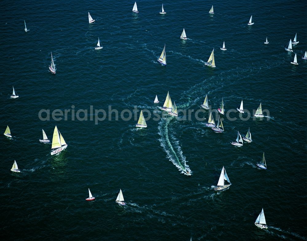 Aerial photograph Kiel - Sailing boats during the Kieler Woche outside Schilksee in the city of Kiel in the state of Schleswig-Holstein. The Kieler Woche (week of Kiel) is a yearly sailing regatta which takes place in the Baltic Sea every June. Most of the races start in the Schilksee part of Kiel. The week is one of the largest sailing sports events in the world