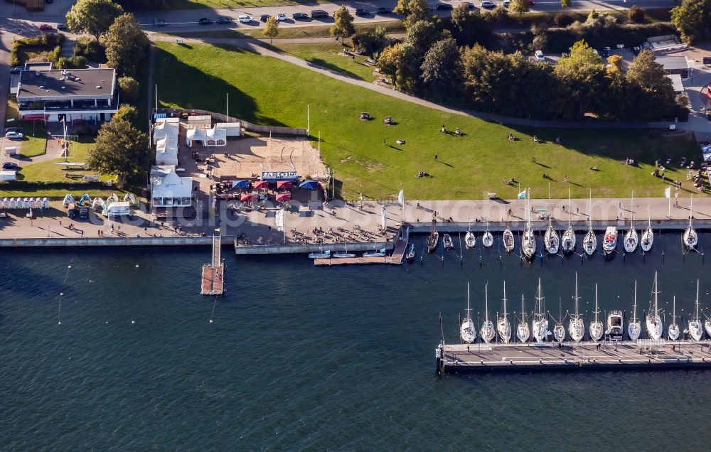 Kiel from above - Sailing camp in Kiel in the state Schleswig-Holstein, Germany. The sailing project Camp 24/7 is a sports facility with a maritime focus on sailing and is open annually in the summer months on the promenade - Kiellinie