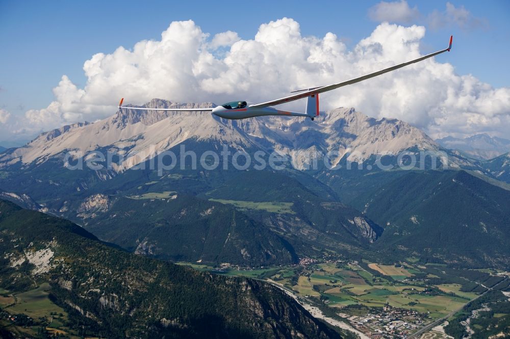 Aerial image Furmeyer - Glider ASH 31 D-KDMB in flight at the foot of Mount Pic de Bure at Furmeyer in Provence-Alpes-Cote d'Azur, France. The ASH-26 is a self-launch high-performance glider from the manufacturer Alexander Schleicher