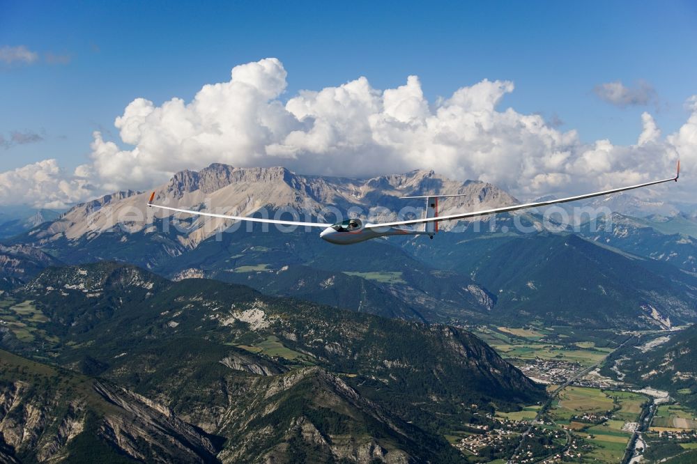 Aerial photograph Furmeyer - Glider ASH 31 D-KDMB in flight at the foot of Mount Pic de Bure at Furmeyer in Provence-Alpes-Cote d'Azur, France. The ASH-26 is a self-launch high-performance glider from the manufacturer Alexander Schleicher