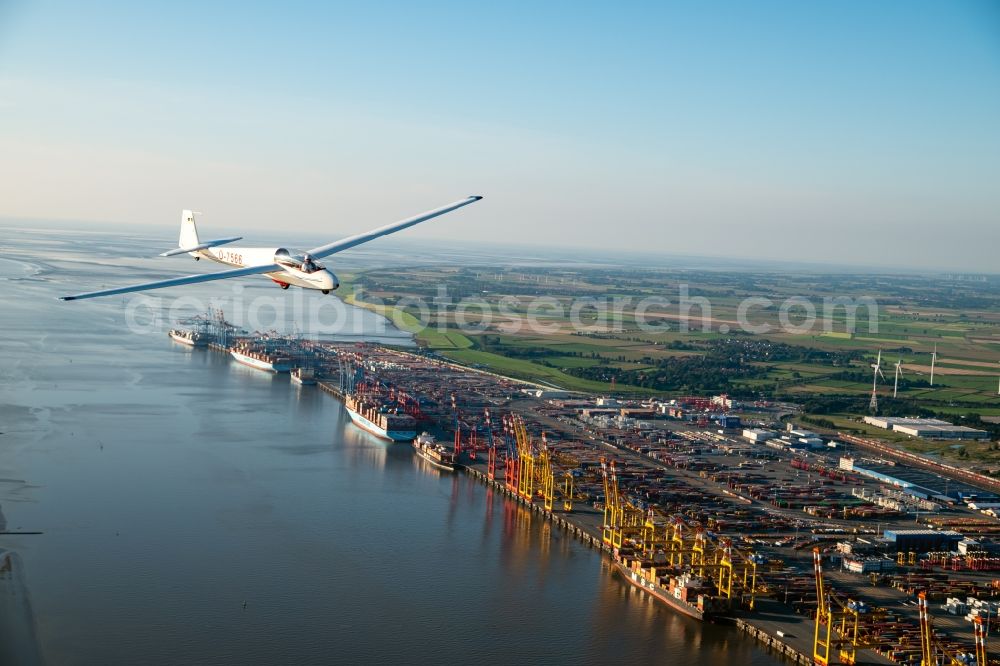 Aerial image Bremerhaven - Glider and sport aircraft ASK-13 flying over the airspace in Bremerhaven in the state Bremen, Germany