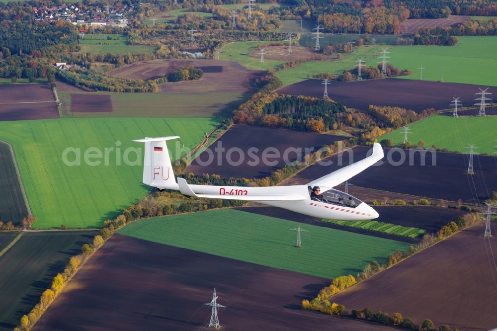Aerial photograph Dollern - Glider and sport aircraft LS-4 D-4103 flying over the autumnal fields close to Dollern in the state Lower Saxony, Germany