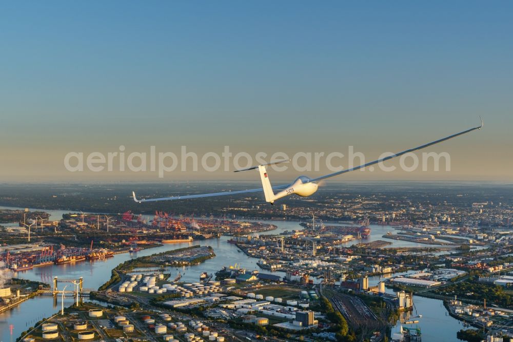 Aerial image Hamburg - Glider and sport aircraft LAk 17b FES flying over the airspace in Hamburg, Germany