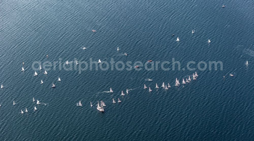 Glücksburg from above - Regatta - Participants with sailing boats in competition on the Flensburg Fjord in Gluecksburg in the state Schleswig-Holstein, Germany