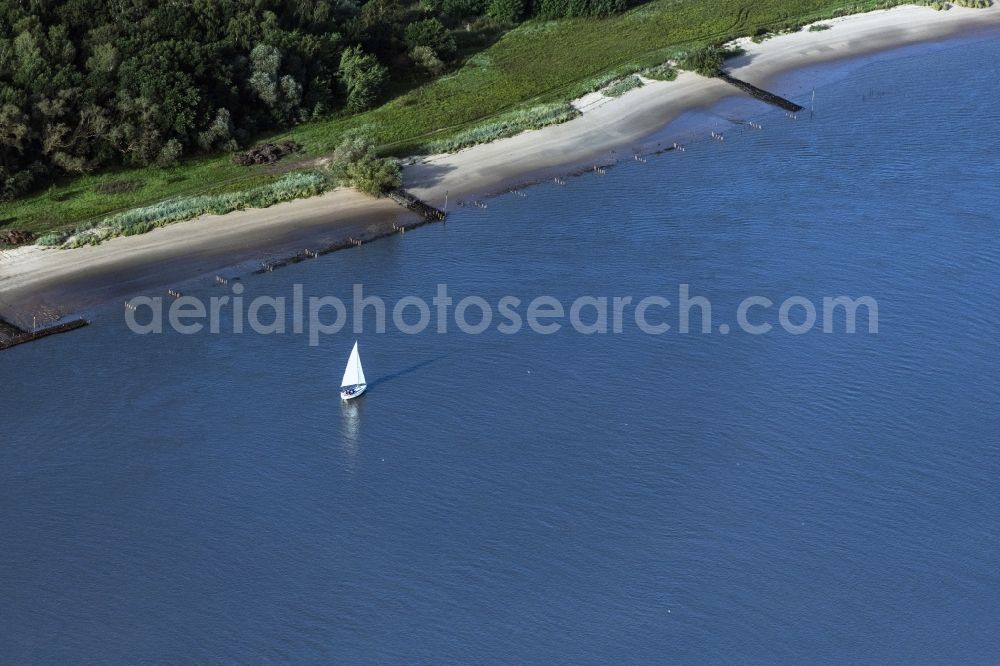 Berne from above - Sailboat under way auf of Weser in Berne in the state Lower Saxony, Germany