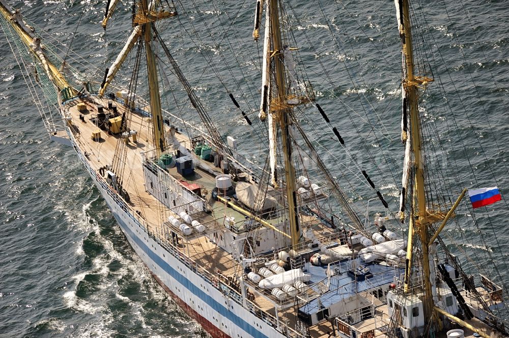 Rostock from above - View of the training ship MIR in the Baltic Sea off Rostock in Mecklenburg Western Pomerania. It is owned by the Admiral Makarov Academy in Saint Petersburg, was built in the Lenin shipyard in Danzig and is considered one of the fastest tall ships in the world
