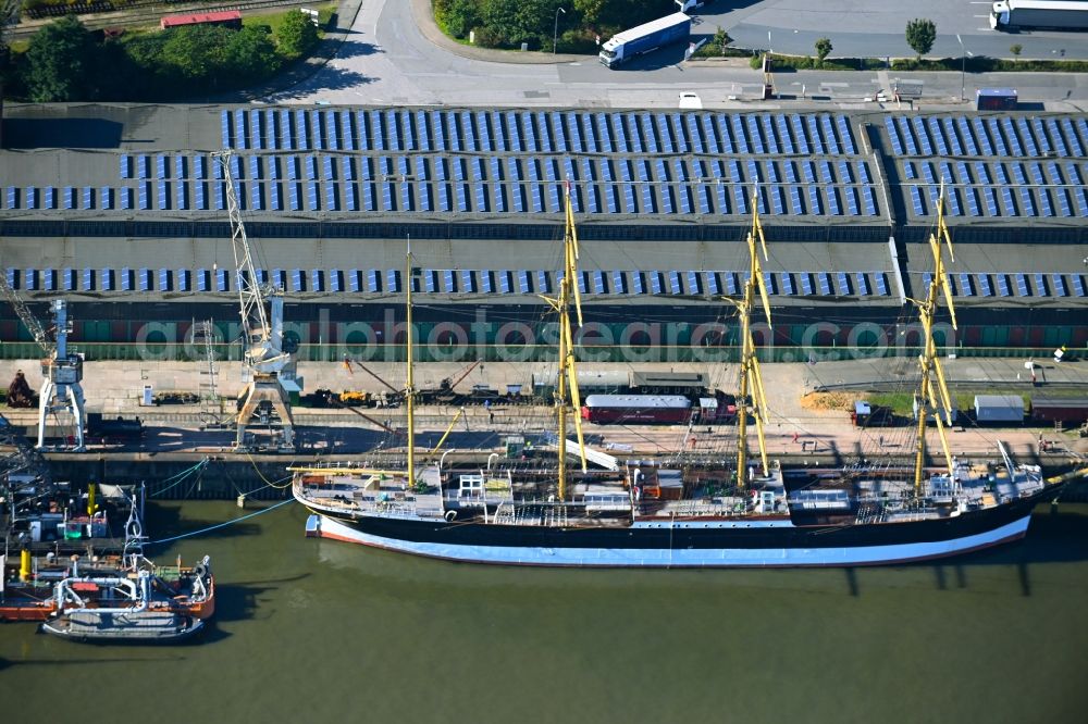 Aerial photograph Hamburg - Sailing ship and four-masted barque a??Pekinga?? in the port of Kleiner Grasbrook, Shed 50 in Hamburg, Germany