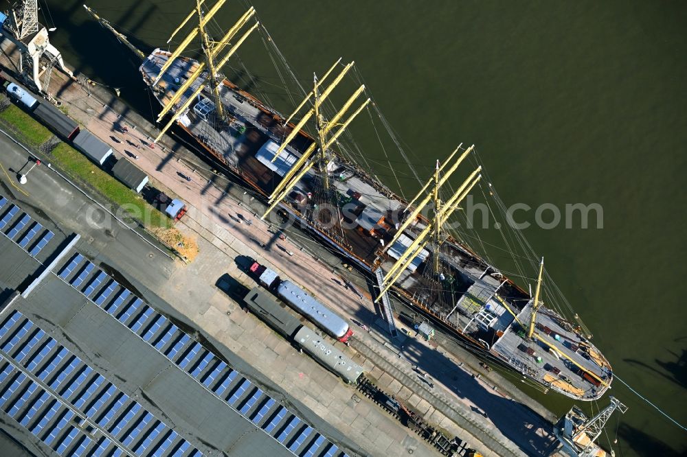 Hamburg from the bird's eye view: Sailing ship and four-masted barque a??Pekinga?? in the port of Kleiner Grasbrook, Shed 50 in Hamburg, Germany