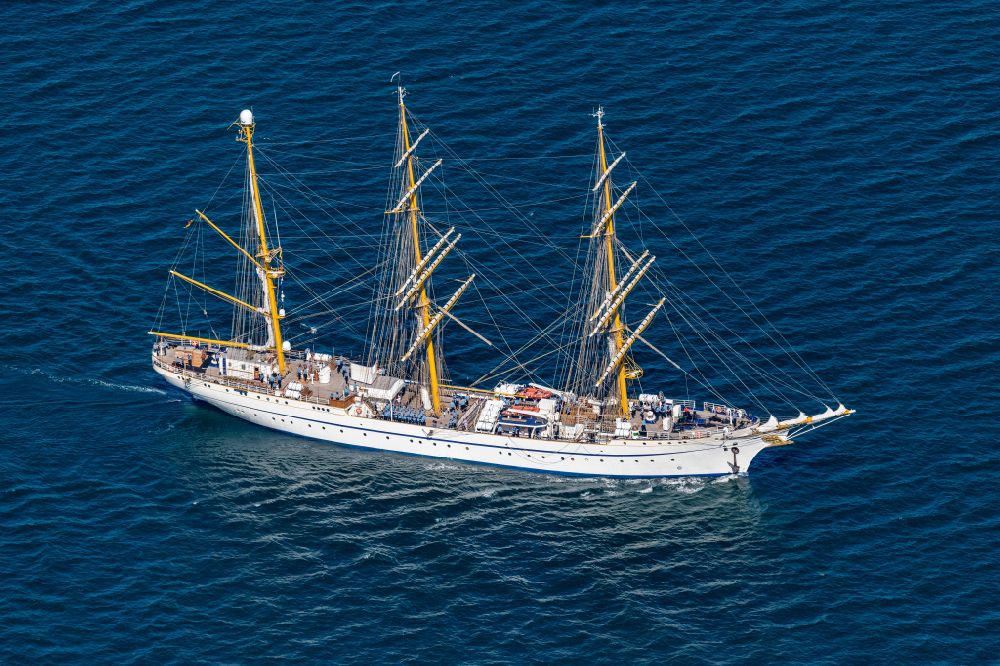 Aerial photograph Rostock - Sail training ship in Warnemuende in the state of Mecklenburg-Western Pomerania. The Gorch Fock when the Hansesail arrives in Warnemuende