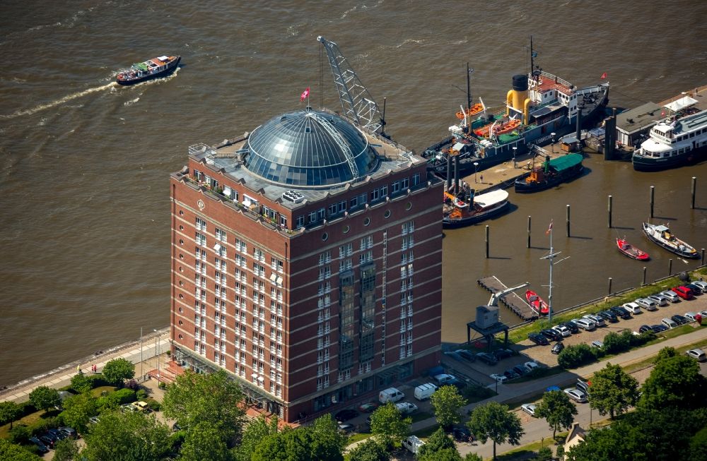 Hamburg from above - Retirement home Augustinum on the river Elbe in the Neumuehlen part of the Hanseatic city of Hamburg in Germany. The home belongs to Augustinum Group and is located in the historic cooling building of Union Kuehlhaus GmbH which was demolished in 1991 and rebuilt