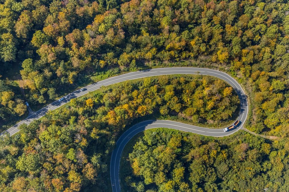 Beverungen from above - Serpentine-shaped curve of a road guide of the country road L838 in Beverungen in the state North Rhine-Westphalia, Germany