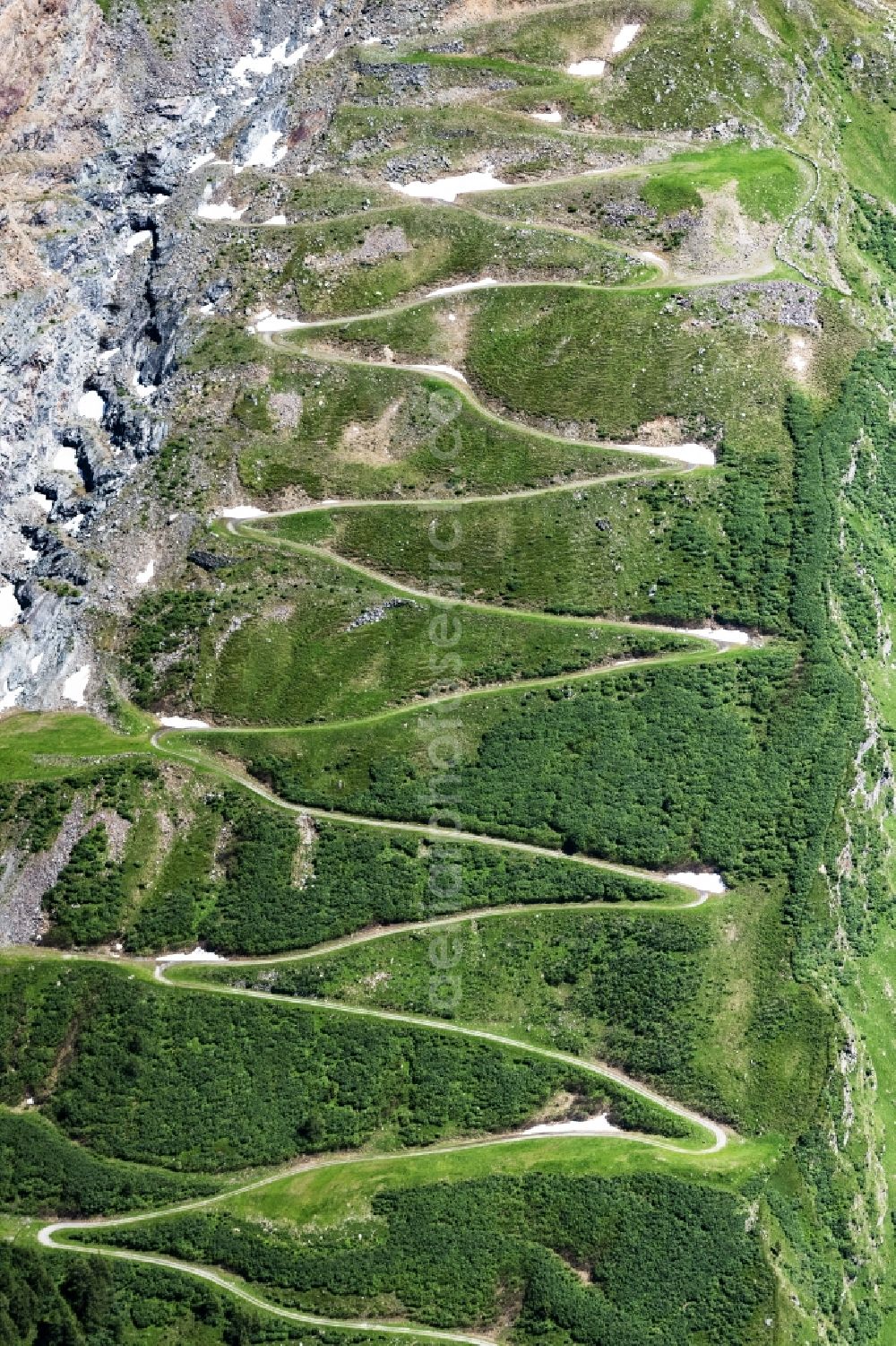 Mittersill from above - Serpentine-shaped curve of a road guide in Mittersill in Salzburg, Austria