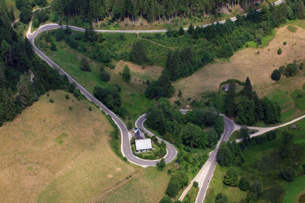 Müllheim from above - Serpentine-shaped curve of a road in the district Sirnitz in Muellheim in the state Baden-Wuerttemberg, Germany. The curved street is often used by bikers