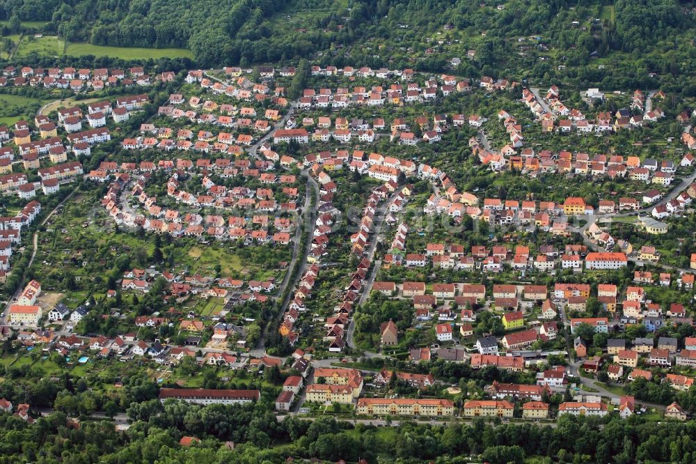 Aerial photograph Jena - The settlement Schlegelsberg in the district Wenigenjena in Jena in Thuringia was founded by the non-profit Housing Association Carl Zeiss GmbH settlement. For this purpose, 382 homes, eight apartment buildings, 40 apartments and four commercial buildings were built beneath the mountain. The central stretch of road is the Eugen Diederichs-Street