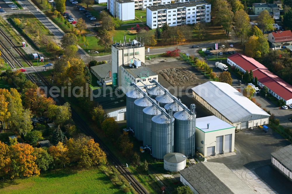Werneuchen from the bird's eye view: High silo and grain storage with adjacent storage in Werneuchen in the state Brandenburg, Germany