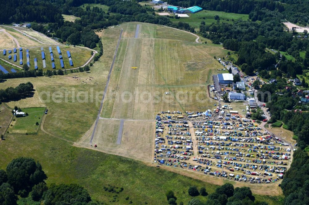 Suhl from the bird's eye view: Simson moped - meeting on airfield Segelflugplatz Suhl-Goldlauter/Heidersbach in Suhl in the state Thuringia, Germany