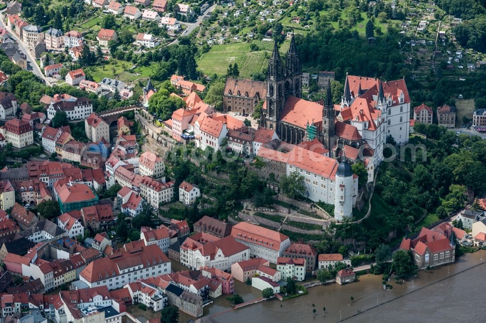 Aerial image Meißen - The situation during the flooding in East Germany on the bank of the river Elbe in the city centre of Meißen in the free state of Saxony. Affected by the high water and flooding are historical buildings of the historic centre and the Gothic Meissen Cathedral