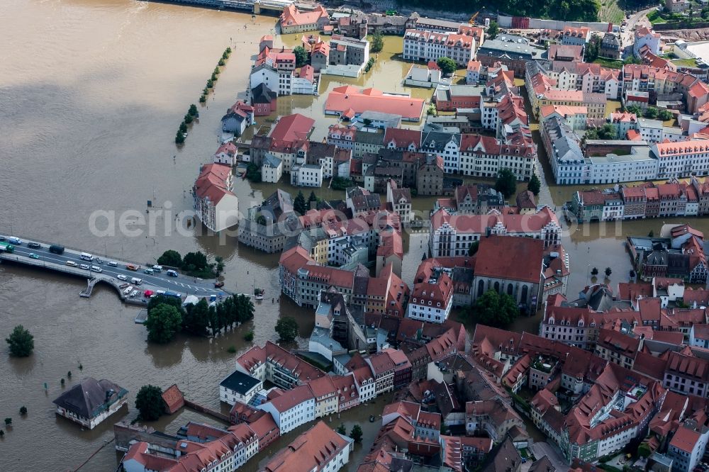 Meißen from above - The situation during the flooding in East Germany on the bank of the river Elbe in the city centre of Meißen in the free state of Saxony. Affected by the high water and flooding are historical buildings of the historic centre