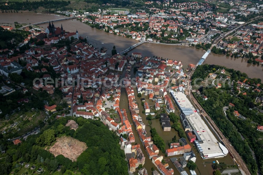 Aerial image Meißen - The situation during the flooding in East Germany on the bank of the river Elbe in the city centre of Meißen in the free state of Saxony. Affected by the high water and flooding are historical buildings of the historic centre and the Gothic Meissen Cathedral
