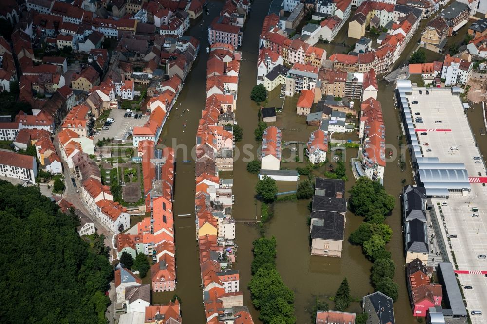 Aerial photograph Meißen - The situation during the flooding in East Germany on the bank of the river Elbe in the city centre of Meißen in the free state of Saxony. Affected by the high water and flooding are historical buildings of the historic centre