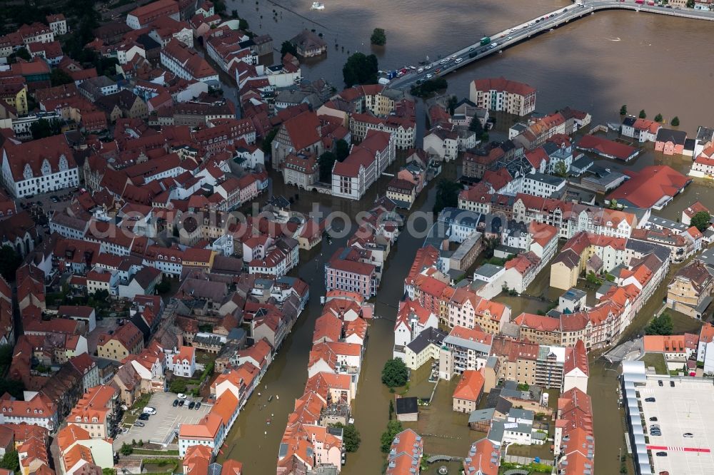 Meißen from above - The situation during the flooding in East Germany on the bank of the river Elbe in the city centre of Meißen in the free state of Saxony. Affected by the high water and flooding are historical buildings of the historic centre