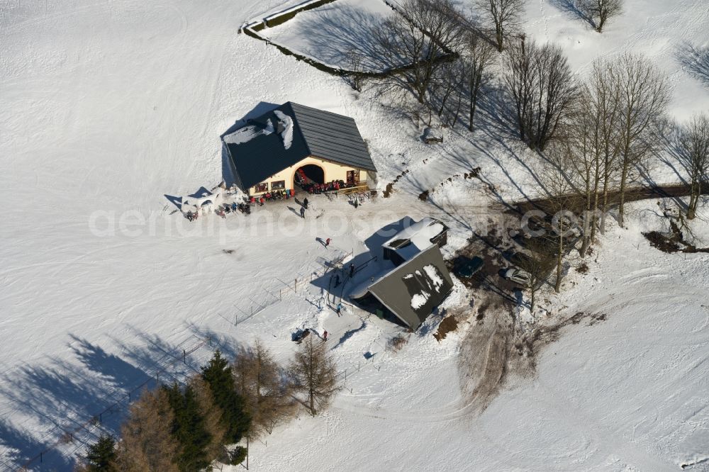 Aerial image Schmiedefeld am Rennsteig - Ski lodge on a winter snow-covered slopes at Schmiedefeld in Thuringia