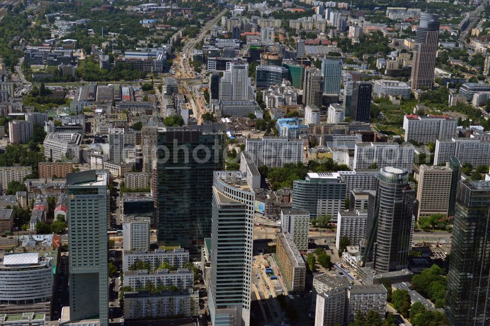 Warschau from the bird's eye view: Skyline of Warsaw in Poland. The central skyline of the city consists of the high rise buildings and towers in its city center. They are mostly hotels, business buildings and office towers. Downtown Warsaw is formed by post-socialist lower and partly historic buildings which are joined by newer and more modern towers