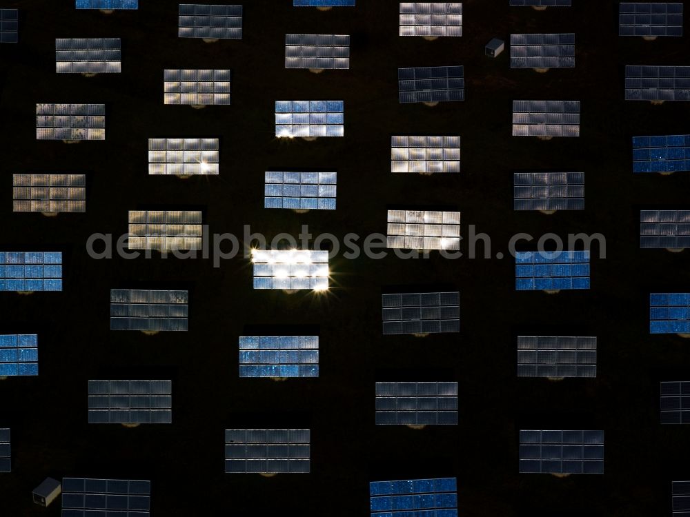 Aerial image Quierschied - The solar plant in Quierschied in the county of Saarbrücken in the state of Saarland. The collectors are surrounded by fields and acres and are placed symmetrically to collect the solar energy. The energy is then used to generate heat as well as power. Detail shot of the mirroring collectors