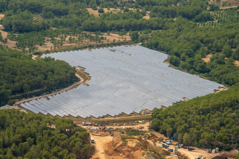 Aerial image Costa de la Calma - Solar power plant and photovoltaic systems on street Carretera Andratx in Costa de la Calma in Balearic island of Mallorca, Spain
