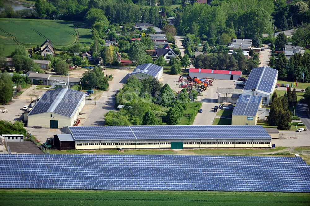 Aerial image Dedelow - Solar power plant and photovoltaic systems on the former runway with the tarmac area of the airfield in Dedelow in the state Brandenburg, Germany