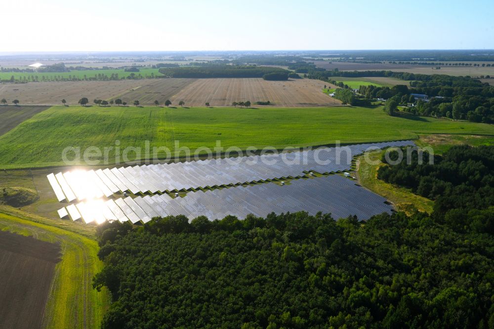 Aerial image Drechow - Rows of panels of a solar power plant and photovoltaic system on a field in Drechow in the state Mecklenburg - Western Pomerania, Germany