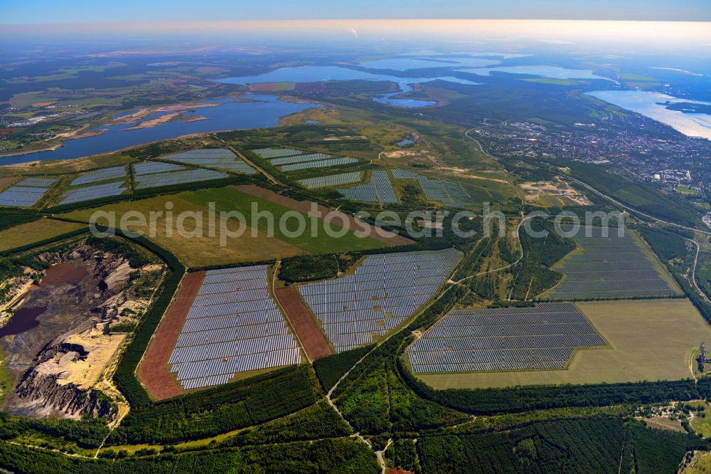 Aerial image Sedlitz - Rows of panels of a solar power plant and photovoltaic system on a field in Sedlitz in the state Brandenburg, Germany