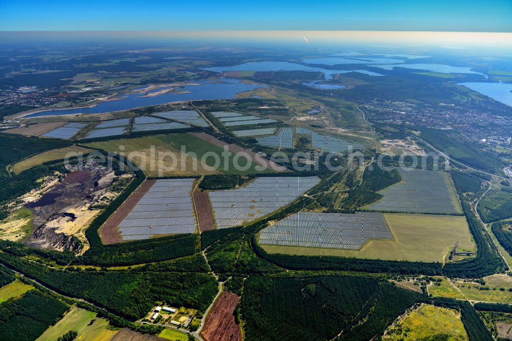 Aerial photograph Sedlitz - Rows of panels of a solar power plant and photovoltaic system on a field in Sedlitz in the state Brandenburg, Germany
