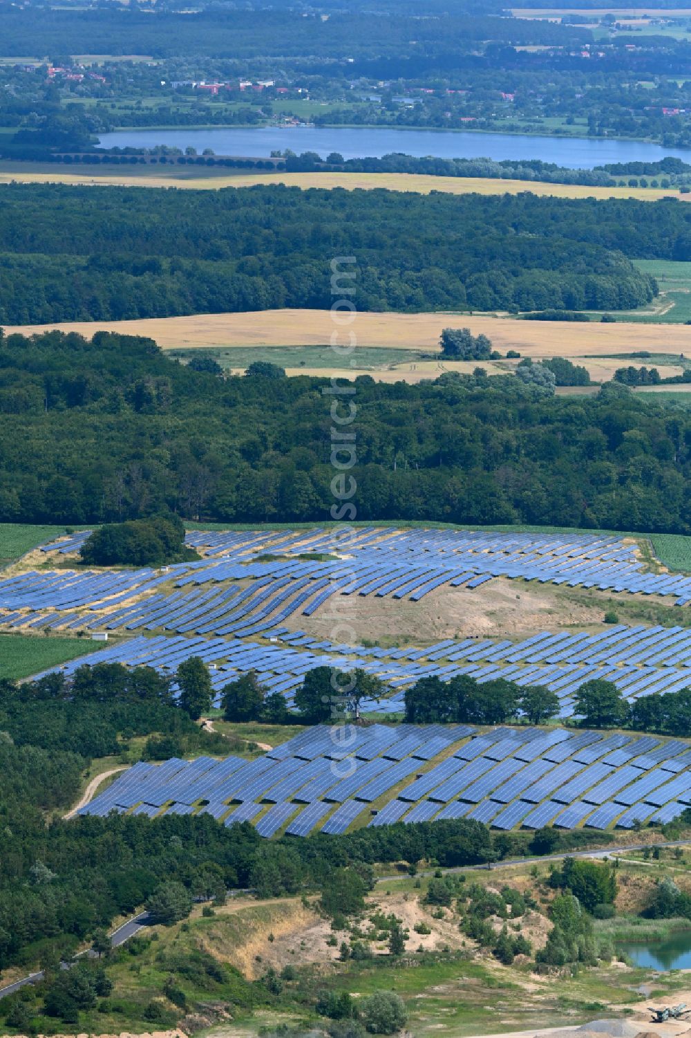 Wendorf from the bird's eye view: Rows of panels of a solar power plant and photovoltaic system on a field in Wendorf in the state Mecklenburg - Western Pomerania, Germany