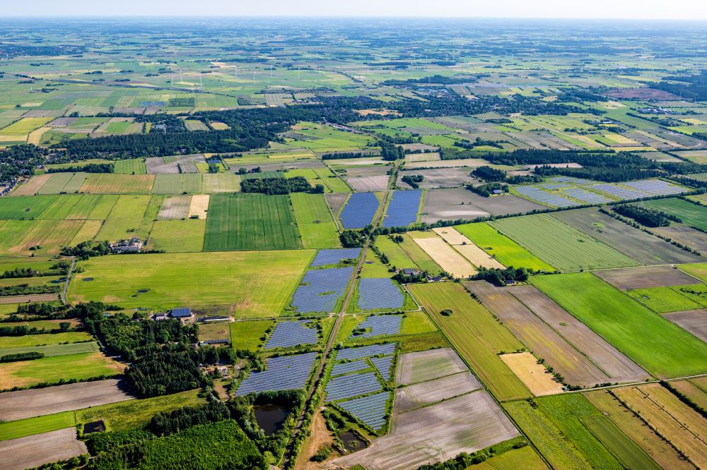 Aerial image Humptrup - Rows of panels of a solar power plant and photovoltaic system on a Solar Power Station field in Humptrup in the state Schleswig-Holstein, Germany