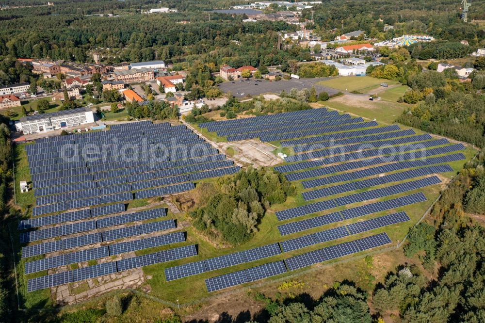 Eberswalde from the bird's eye view: Rows of panels of a solar power plant and photovoltaic system on Festplatz Chemische Fabrik in Eberswalde in the state Brandenburg, Germany
