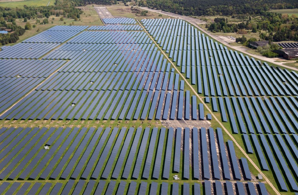 Alt Daber from the bird's eye view: Solar power plant and photovoltaic systems on the airfield in Alt Daber in the state Brandenburg, Germany