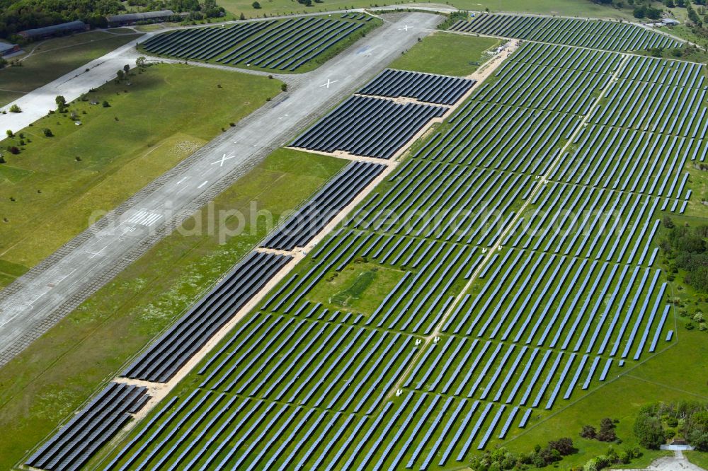 Werneuchen from above - Solar power plant and photovoltaic systems on the airfield on street Alte Hirschfelder Strasse in Werneuchen in the state Brandenburg, Germany