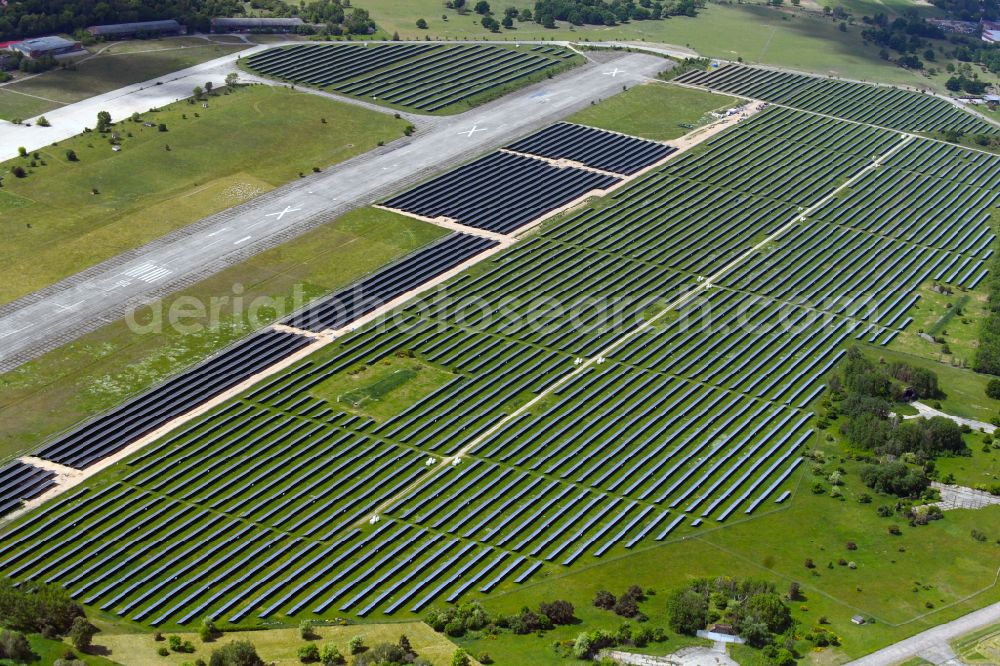 Werneuchen from the bird's eye view: Solar power plant and photovoltaic systems on the airfield on street Alte Hirschfelder Strasse in Werneuchen in the state Brandenburg, Germany