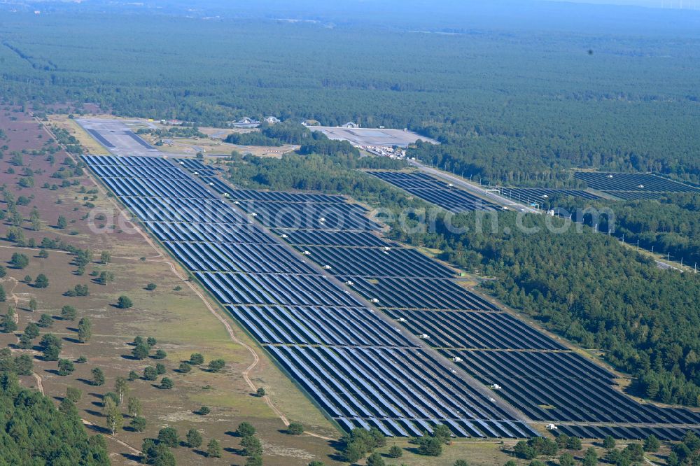 Groß Dölln from the bird's eye view: Solar power plant and photovoltaic systems on the former airfield in Gross Doelln in the state Brandenburg, Germany