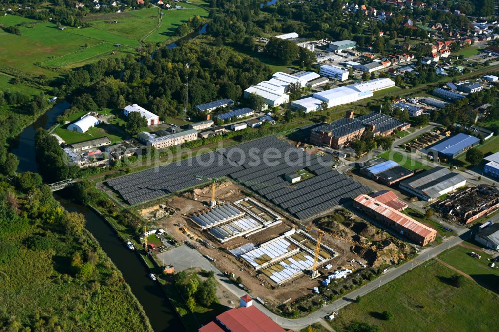 Neustadt-Glewe from above - Solar power plant and photovoltaic systems Consilium Solarpark Neustadt-Glewe in Neustadt-Glewe in the state Mecklenburg - Western Pomerania, Germany