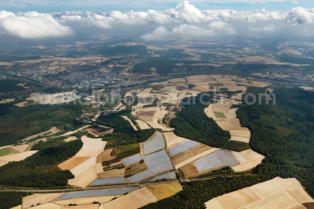 Karlstadt from above - Panel rows of photovoltaic and solar farm or solar power plant of Buergersolarpark Laudenbach of the GenoEnergie Karlstadt eG in the district Rohrbach in Karlstadt in the state Bavaria, Germany