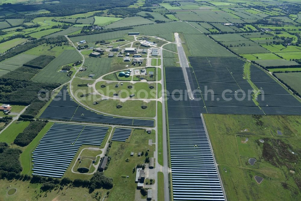 Eggebek from above - Panel rows of photovoltaic and solar farm or solar power plant of the company Moehring Energie GmbH and mainova AG in Eggebek in the state Schleswig-Holstein