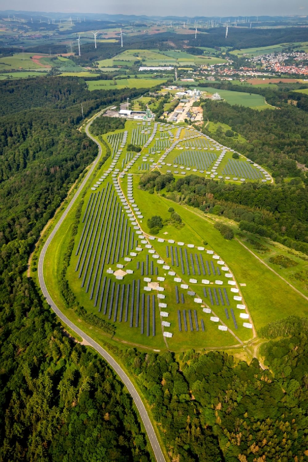 Bad Arolsen from above - Panel rows of photovoltaic and solar farm or solar power plant on the former Gelaende of Prinz-Eugen-Kaserne in Bad Arolsen in the state Hesse, Germany
