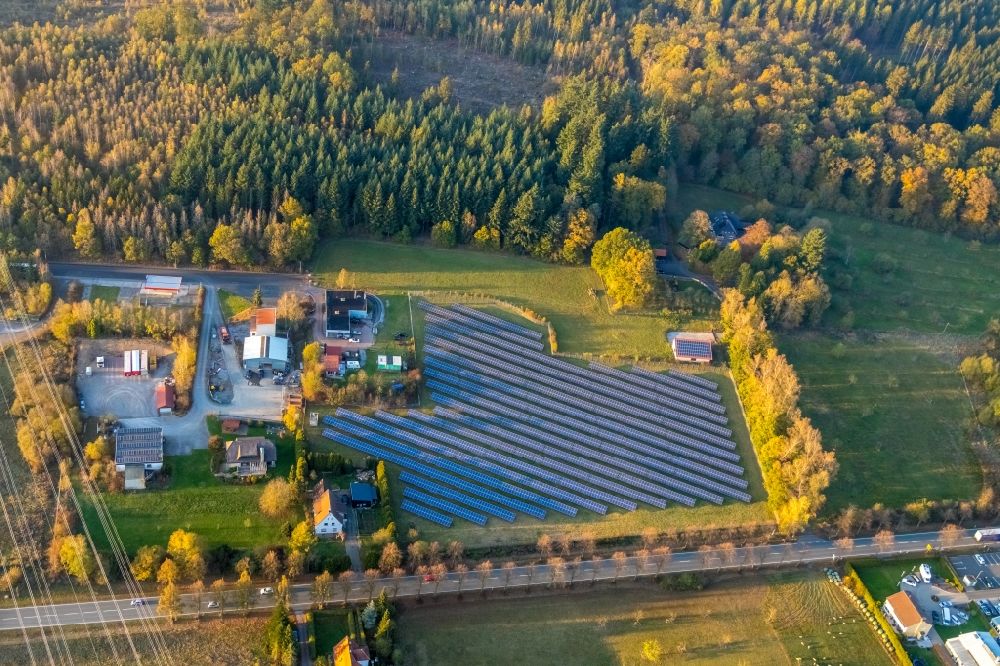 Marsberg from above - Panel rows of photovoltaic and solar farm or solar power plant along the Carl-Reinke-Strasse in the district Bredelar in Marsberg in the state North Rhine-Westphalia, Germany