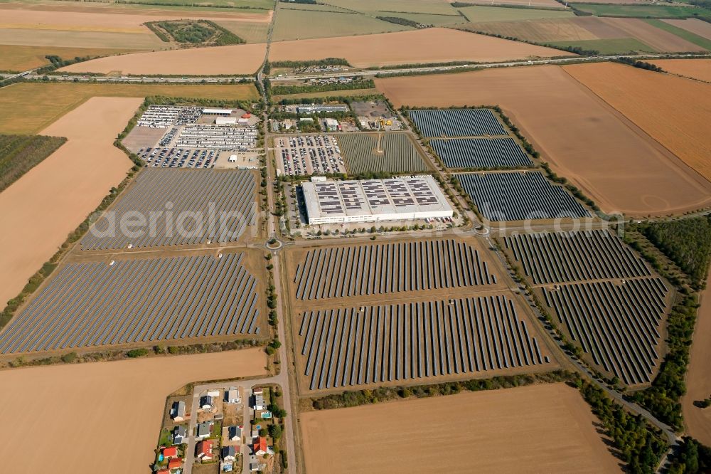 Landsberg from above - Panel rows of photovoltaic and solar farm or solar power plant in the commercial area in the district Sietzsch in Landsberg in the state Saxony-Anhalt, Germany