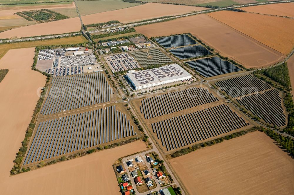 Aerial photograph Landsberg - Panel rows of photovoltaic and solar farm or solar power plant in the commercial area in the district Sietzsch in Landsberg in the state Saxony-Anhalt, Germany