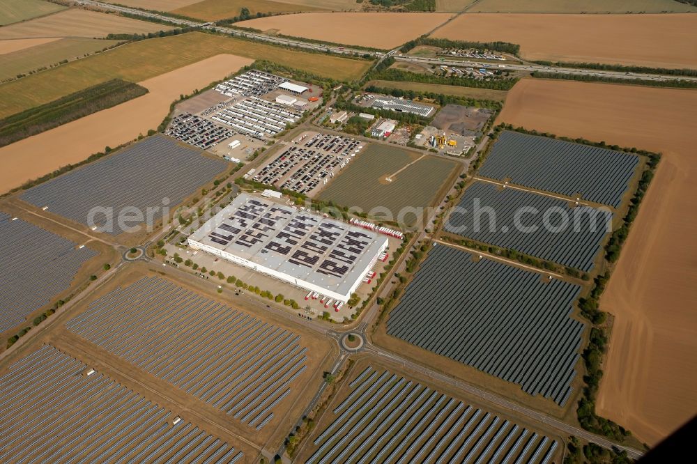 Landsberg from above - Panel rows of photovoltaic and solar farm or solar power plant in the commercial area in the district Sietzsch in Landsberg in the state Saxony-Anhalt, Germany