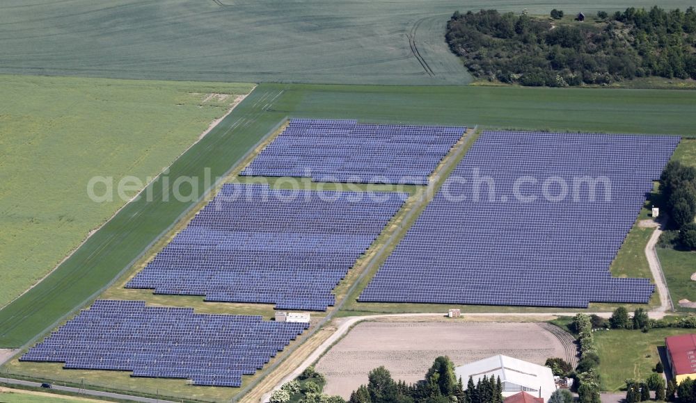 Herbsleben from the bird's eye view: Panel rows of photovoltaic and solar farm or solar power plant in Herbsleben in the state Thuringia, Germany