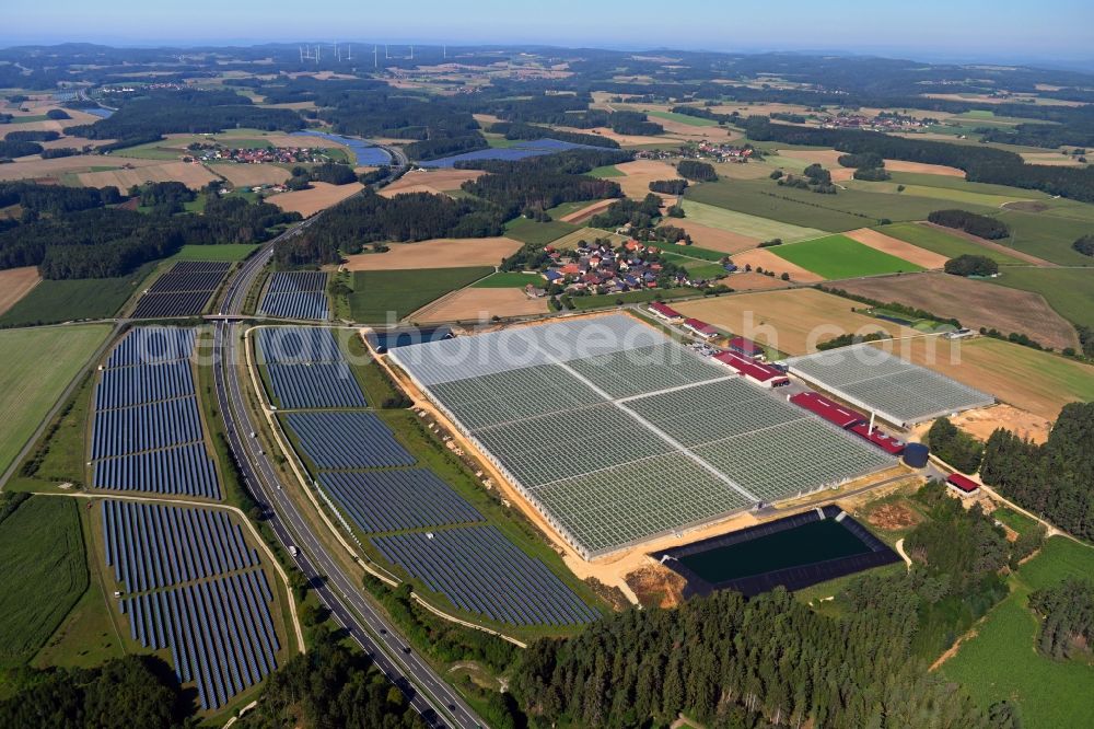 Wonsees from above - Panel rows of photovoltaic and solar farm or solar power plant Jura-Solarpark on BAB A70 in Wonsees in the state Bavaria, Germany